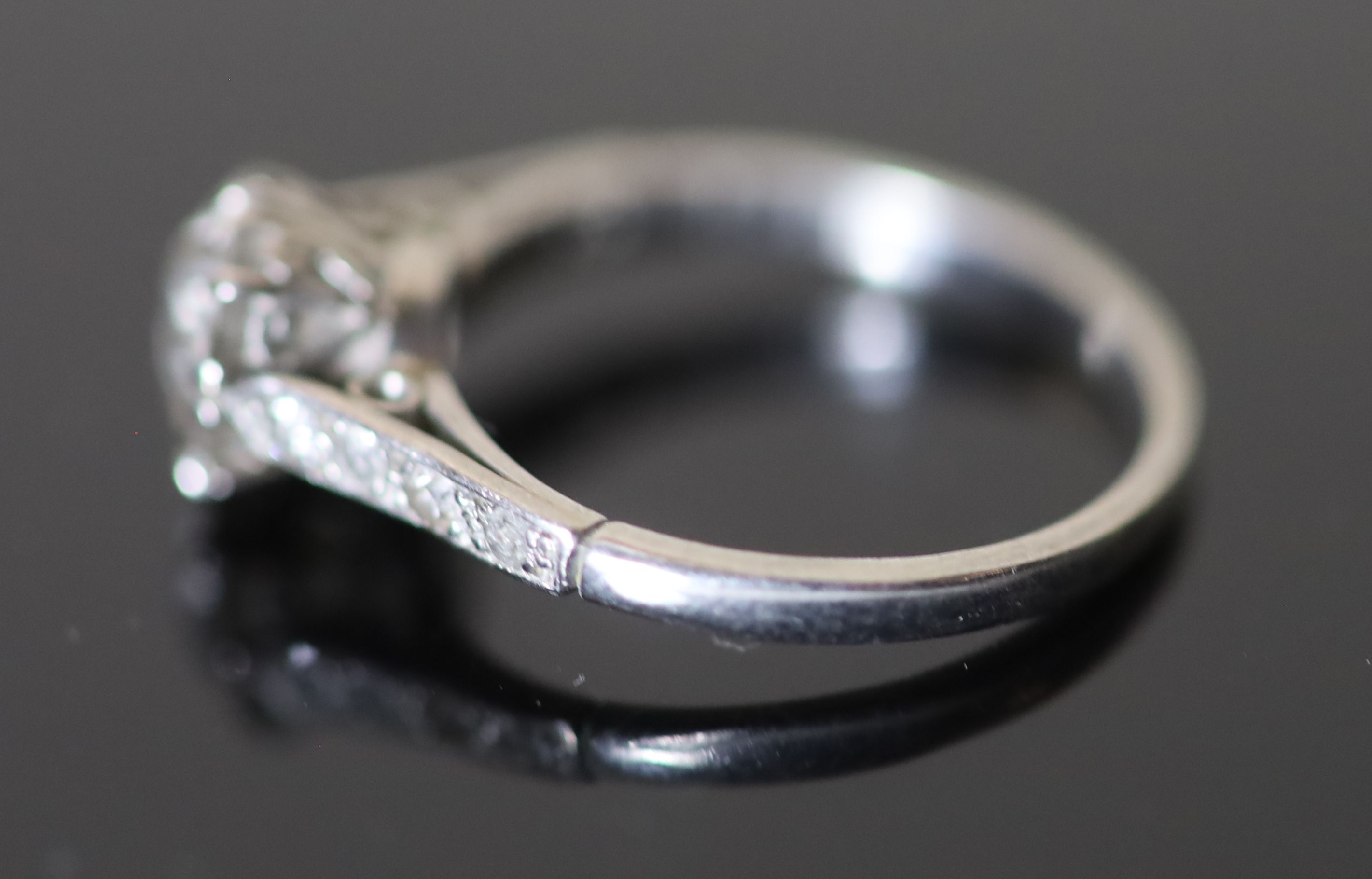 A mid 20th century white gold and single stone diamond ring,